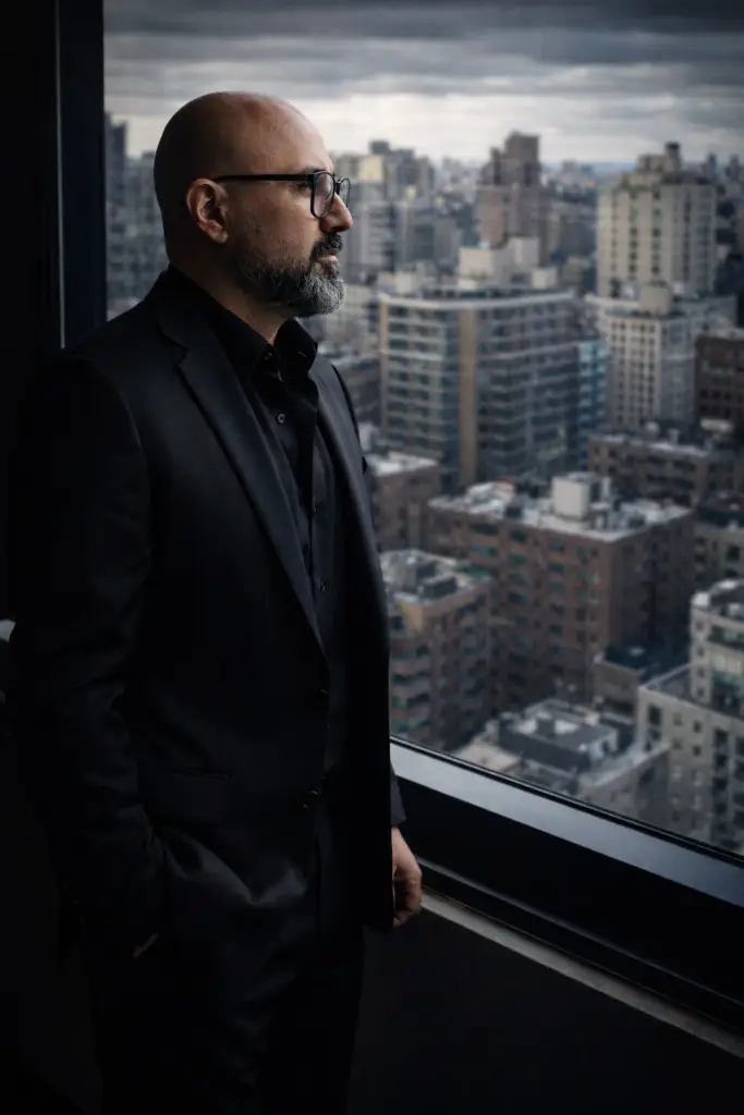 Patrick Iturra overlooking U.S. real estate assets from a corporate office